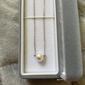 Genuine pearl necklace from Japan. 18” chain with accent beads.